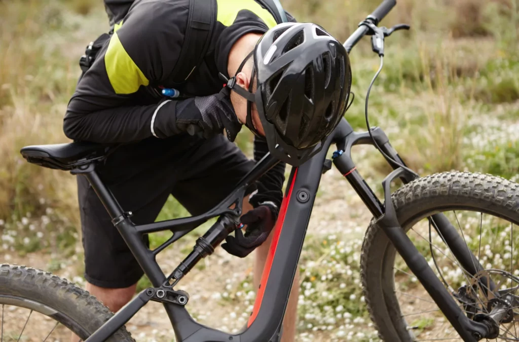 biker in helmet and gloves checking systems